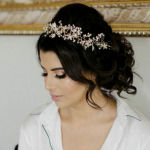 bridal hairstyle loose chignon with pearl hair jewellery