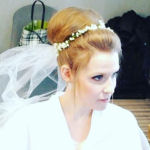 bridal hairstyle updo with floral tiara and veil