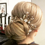 bridal hairstyle chignon with floral hair jewellery