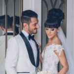 bridal hairstyle updo with bangs and veil