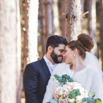 bridal hairstyle updo with large bun and veil