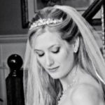 bridal hairstyle long swept back half up with cathedral length veil