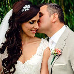 bridal hairstyle side swept with jewellery and veil