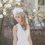 bridal hairstyle long curls with fascinator