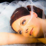 romantic bridal hairstyle chignon with veil